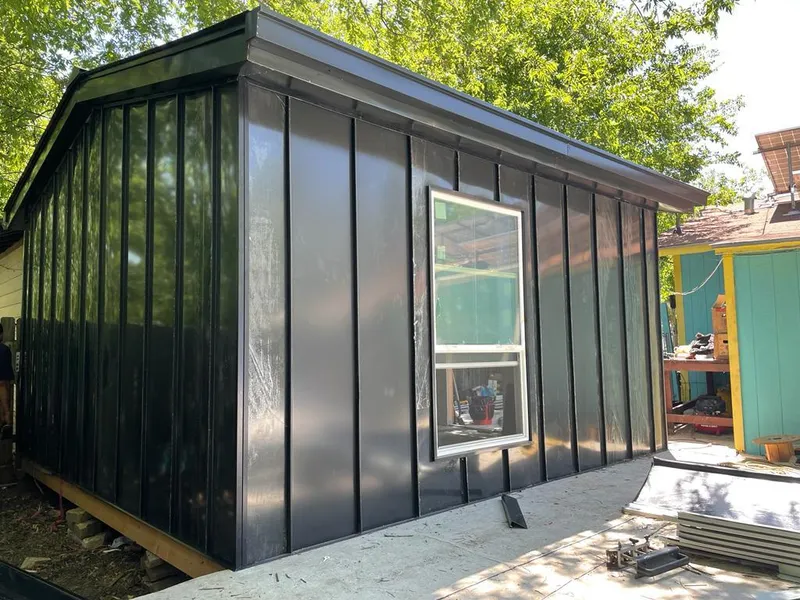 Black standing seam metal wall panels for Roof Inspection in Lincoln